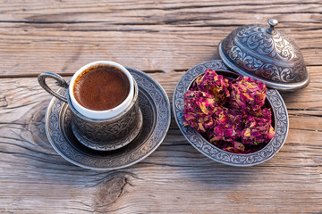 Traditional delicious Turkish coffee and Turkish rose dessert