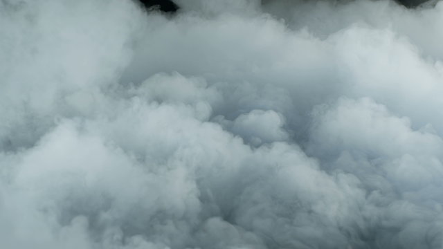 Photo of Real Smoke on a black background - realistic overlay for different projects.