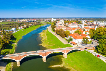 Panoramic view of town of Sisak in Croatia from drone, the old town center and bridge over Kupa...