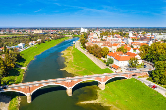 Fototapeta Panoramic view of town of Sisak in Croatia from drone, the old town center and bridge over Kupa river