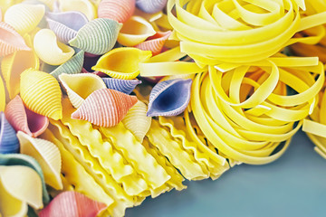 Various types of Italian pasta, selective focus.