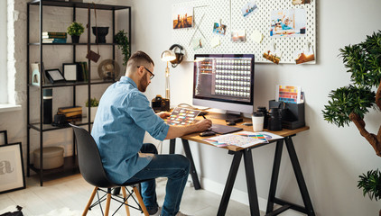 Modern designer working in home office