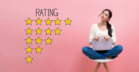 Rating theme with young woman using a laptop computer