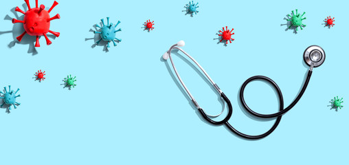 Stethoscope with coronavirus theme overhead view - flat lay