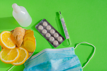 Coronavirus home treatment, medicine concept.  Stay home. Lemon and ginger,  Prevention face mask,...