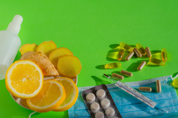 Coronavirus home treatment, medicine concept.  Stay home. Lemon and ginger,  Prevention face mask,...