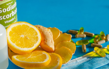 Coronavirus home treatment, medicine concept.  Stay home. Lemon and ginger,  Prevention face mask,...