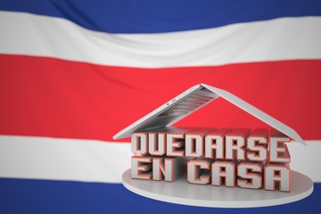 QUEDARSE EN CASA or STAY HOME text in Spanish under open laptop against the Costa Rican flag. Coronavirus self-isolation in Costa Rica 3D rendering
