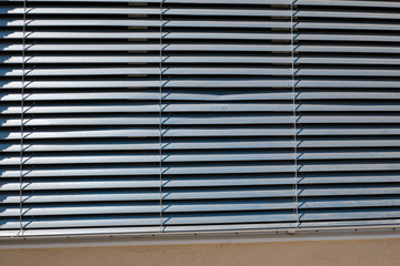 Aluminium roller shutter closed at a house
