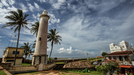  Lighthouse and palm trees