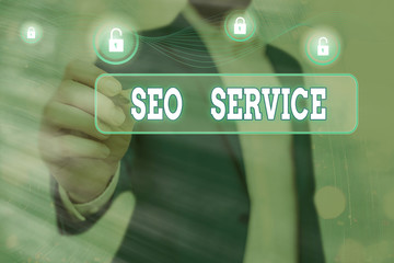 Handwriting text writing Seo Service. Conceptual photo techniques and procedures to increase the...