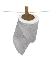 Toilet paper roll hang drying on string, clothesline with a clothespin, laundering sheets isolated on white background