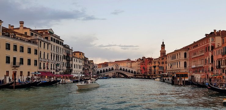 Panoramic photo of the Grand Canal in Italian Venice at sunset.