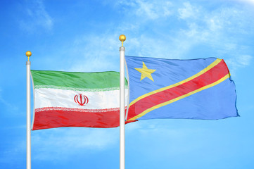 Iran and Congo Democratic Republic two flags on flagpoles and blue cloudy sky