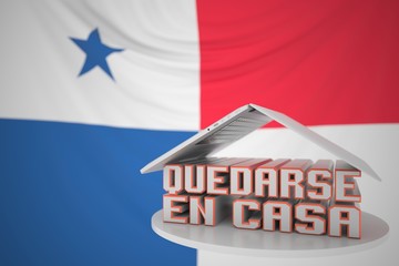 Fototapeta premium QUEDARSE EN CASA or STAY HOME text in Spanish under open laptop against the Panamian flag. Coronavirus self-isolation in Panama 3D rendering