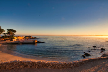 Fototapeta premium Tranquil sunrise scene at Pacific Gove Beach on the Monterey Peninsula.