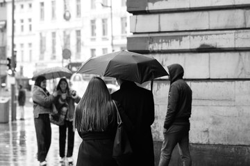 raining outside umbrella