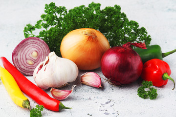 Different spices: onion. garlic, parsley and pepper	