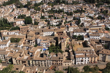Obraz premium Aerial view of the Albaicin city taken from Watch Tower (Torre de la Vela) of the historical Alhambra Palace complex in Granada, Andalusia, Spain.