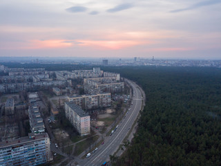 Sunset over the residential district of Kiev. Aerial drone view.