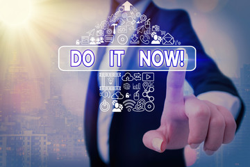 Conceptual hand writing showing Do It Now. Concept meaning not hesitate and start working or doing...