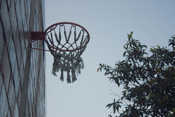 basketball hoop on background of blue sky