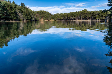 Bassa d&acute;Oles lake with reflection in winter.