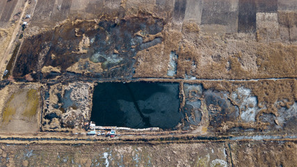 the top view of the fisher on iced lake