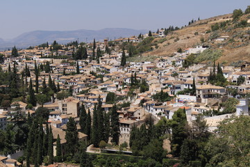 Fototapeta na wymiar Aerial view of the Albaicin city taken from Generalife Gardens of the historical Alhambra Palace complex in Granada, Andalusia, Spain.