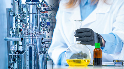 Microbiological laboratory. Equipment for the synthesis of new drugs. Pharmacology. Chemist's hand,...
