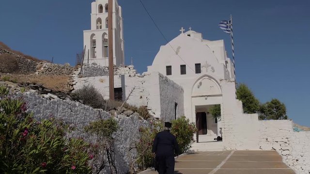 greece island folegandros priest white church tradition 