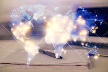 Double exposure of business theme drawings and desk with open notebook background. Concept of...