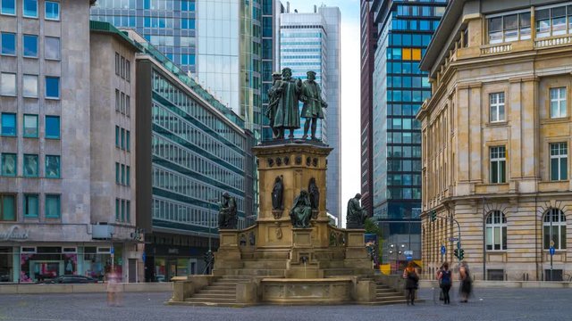 Frankfurt am main skyscrapers main square time lapse hyperlapse. Gutenberg monument on Ro&szlig;markt square, germany.