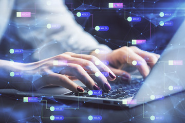 Multi exposure of woman hands working on computer and data theme hologram drawing. Tech concept.