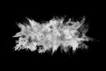 White powder explosion on black background. Colored cloud. Colorful dust explode. Paint Holi.