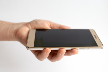 woman hand holding smartphone on the white background