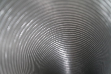 Obraz premium aluminum duct silver Peek inside