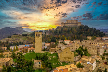 Aerial view of San Leo town and fortress used once as a prison on a rocky outcrop near the Adriatic...