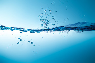 Beautiful water waves Splashed water wave in clean blue water