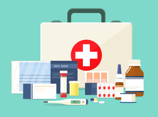 First aid kit. Face mask and various medications. Vector illustration in cartoon style.