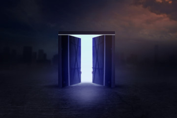 Open wooden door to the new world with green environment. Climate change concept. night to daylight