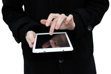 a tablet in the hands of a man. Isolate