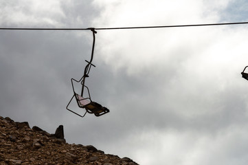 Chairlifts at the top of a sky mountain
