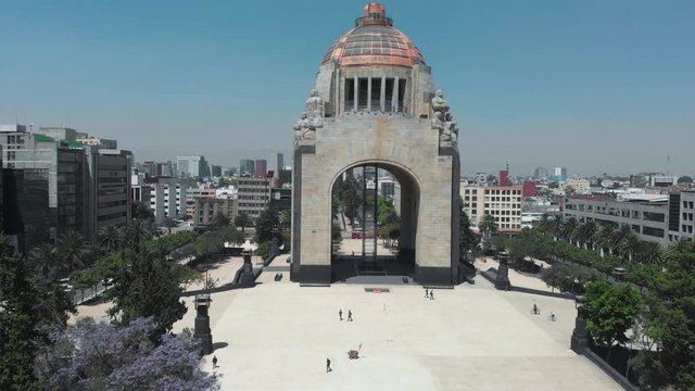 Panoramic aerial shot zoom out of the Monument to the Revolution and the Plaza de la Revolución. During the covid-19 pandemic contingency in March 2020