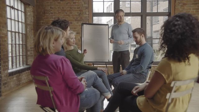 Group in workshop looking at whiteboard