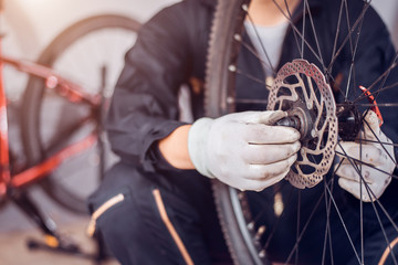 Bicycle maintenance, Rider is assembling the bicycle parts, Close-up.