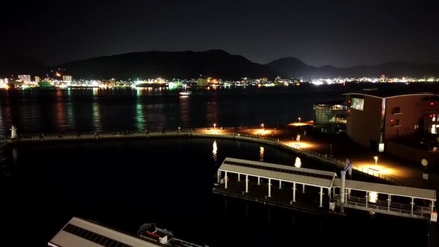 Night view of the harbor along the strait