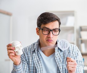 Medical student sitting at the lecture in university