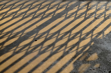 Shadow Shape of steel  door on floor .Background concept 