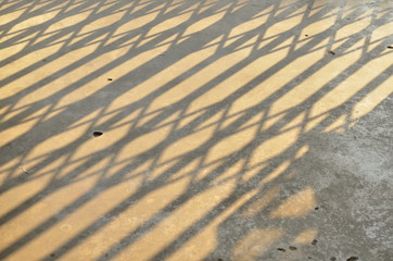 Shadow Shape of steel  door on floor .Background concept 